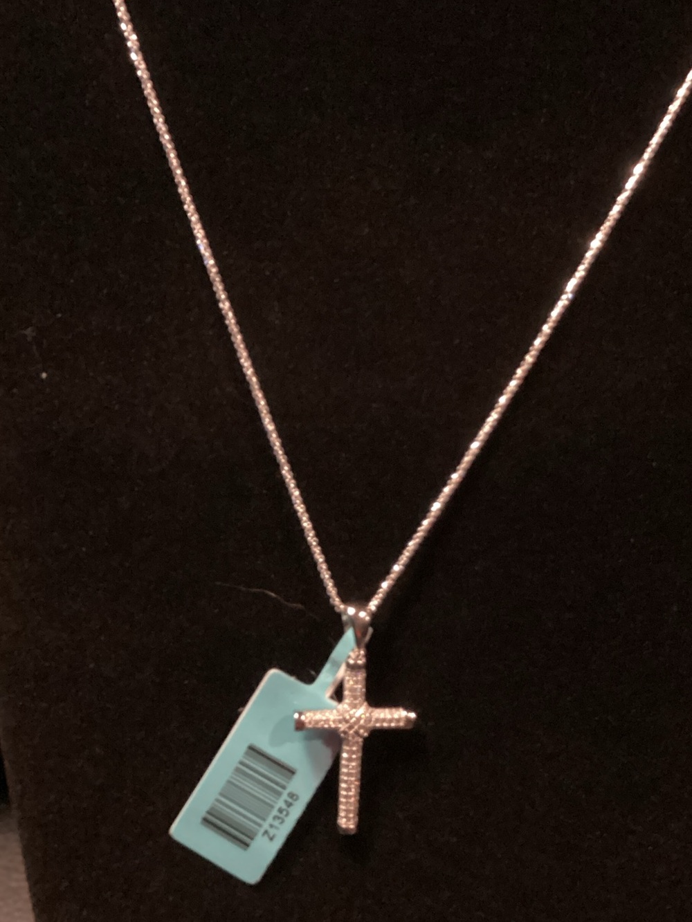 925 20 in sterling silver chain paired with Moissonite and Sterling cross